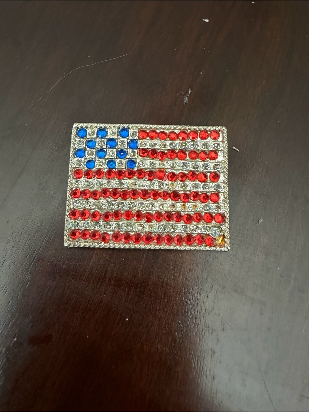 Vintage Red, Blue and Clear Rhinestone American Flag Brooch. Silver tone setting